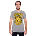 Immagine del prodotto Harry Potter - T-shirt grigia con stemma Hufflepuff