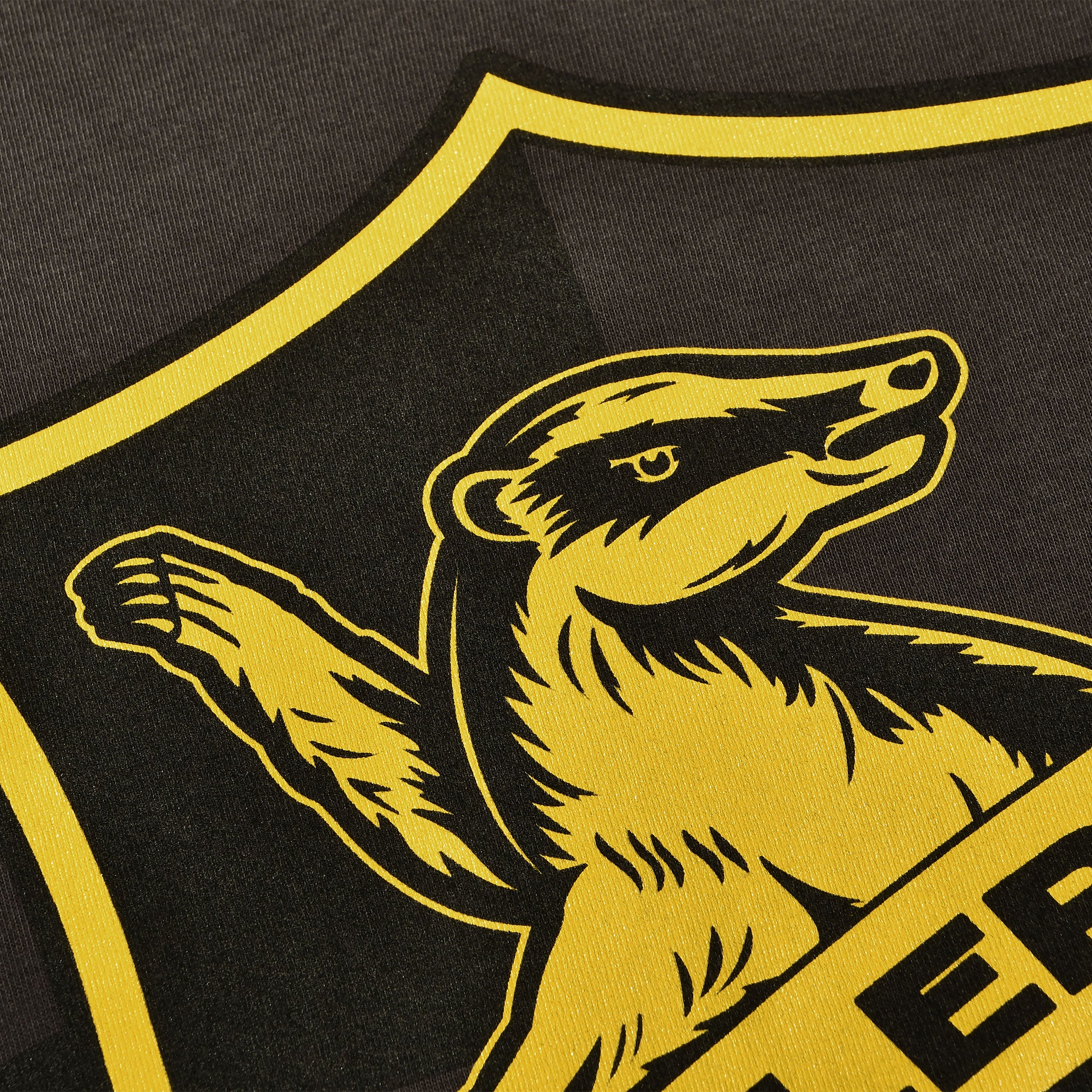 Immagine del prodotto T-shirt grigia con logo Hufflepuff - Harry Potter