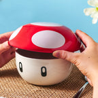 Immagine del prodotto Ciotola Super-Fungo con coperchio per fan di Super Mario
