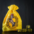 Immagine del prodotto Harry Potter - Set di dadi RPG Hufflepuff 5 pezzi con sacchetto dei dadi giallo