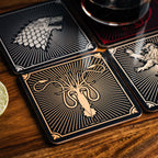 Immagine del prodotto Game of Thrones - Sottobicchieri con stemmi delle case, set di 4
