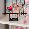 Immagine del prodotto Demon Slayer - Penna a sfera katana di Tanjiro con supporto