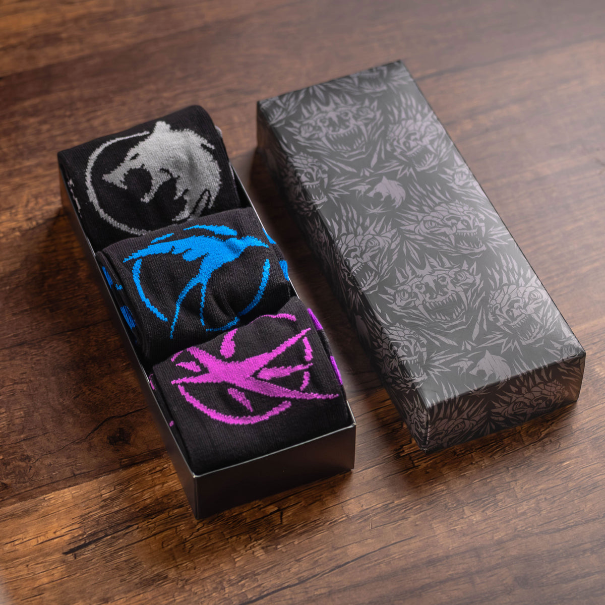 The Witcher - Lot de 3 paires de chaussettes Symbols dans une boîte cadeau