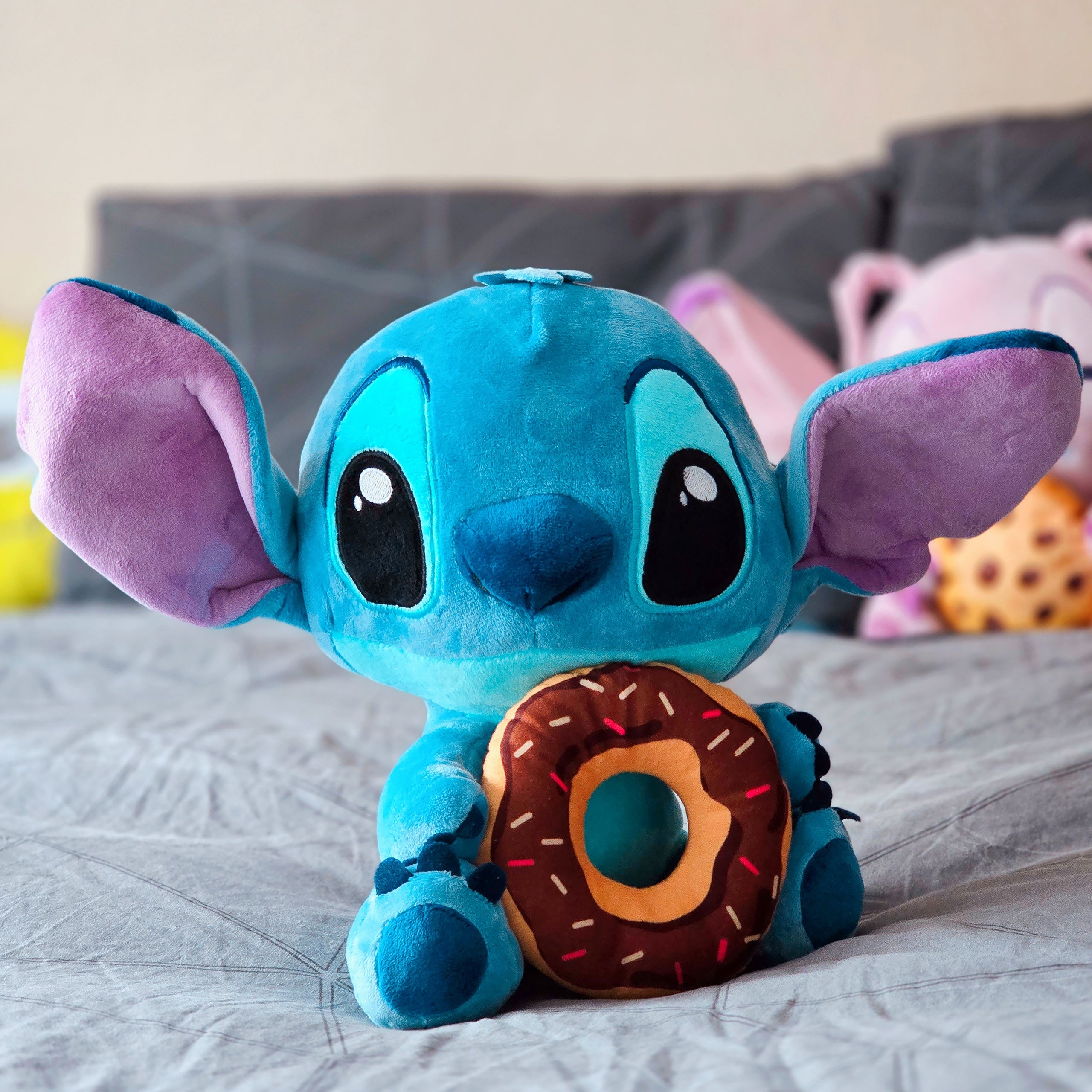 Immagine del prodotto Lilo & Stitch peluche Stitch con donut 25 cm