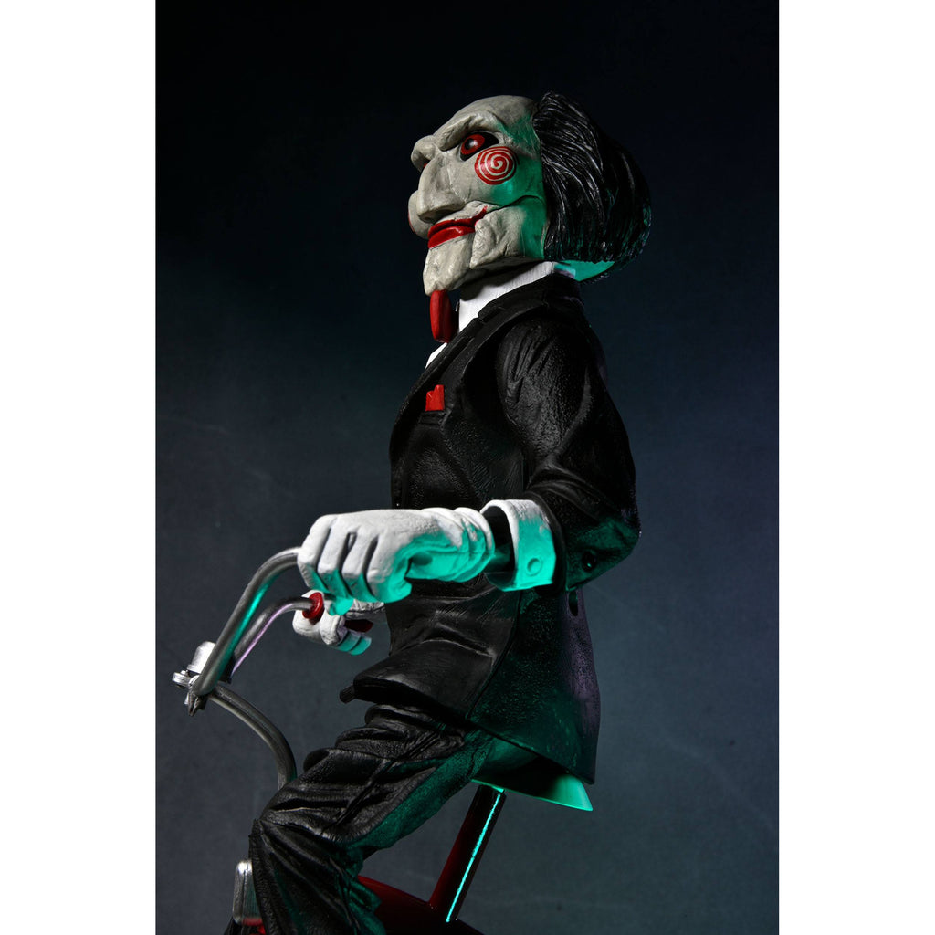 Image produit Figurine articulée Saw avec son Billy sur tricycle 30 cm