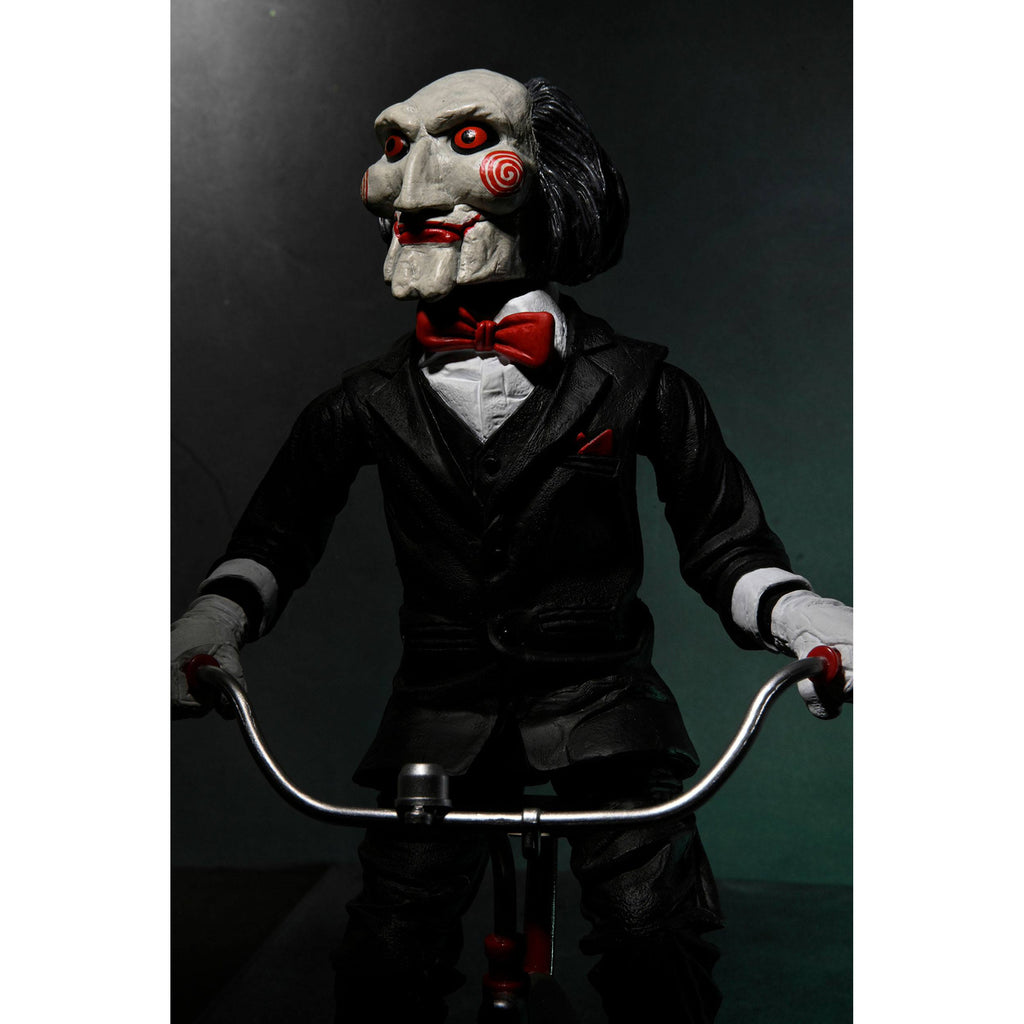 Image produit Figurine articulée Saw avec son Billy sur tricycle 30 cm