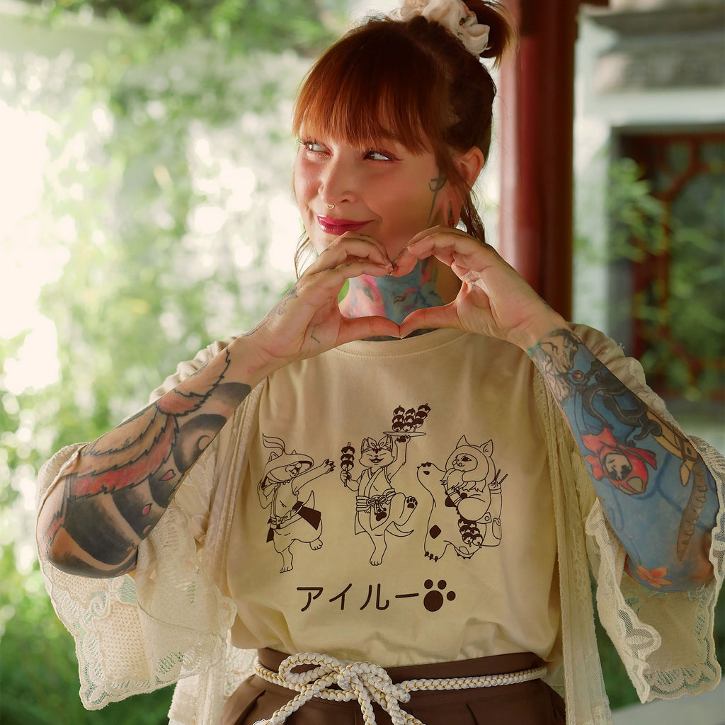 Immagine del prodotto T-shirt Palicos per fan di Monster Hunter beige